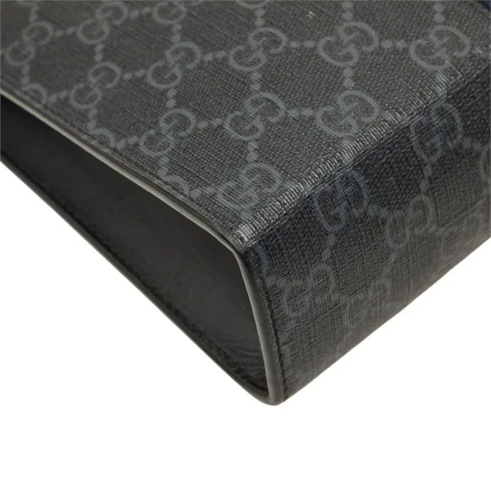 Gucci GG Supreme Clutch Bag